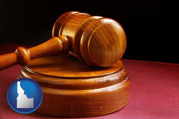 an arbitrator's wooden gavel - with Idaho icon