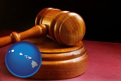 hawaii map icon and an arbitrator's wooden gavel