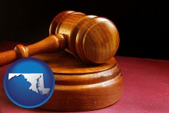 maryland map icon and an arbitrator's wooden gavel