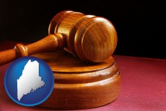 maine map icon and an arbitrator's wooden gavel